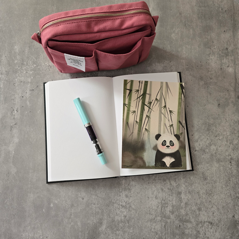 Panda in bamboo forest blotting paper