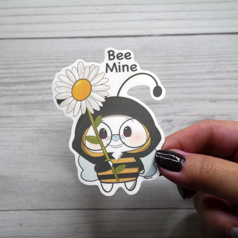 Ben-E Bee Mine holding a Daisy Vinyl Sticker